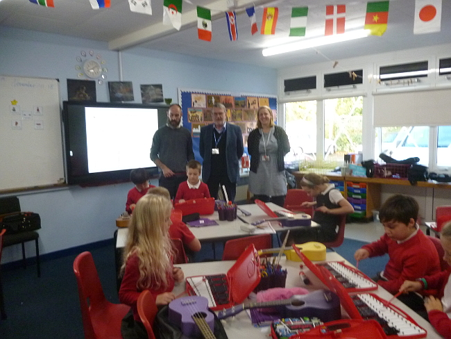 Howard Davies Chairman and Trustee and Linda Scott OBE Trustee visting the school to see the Glockenspiels in action