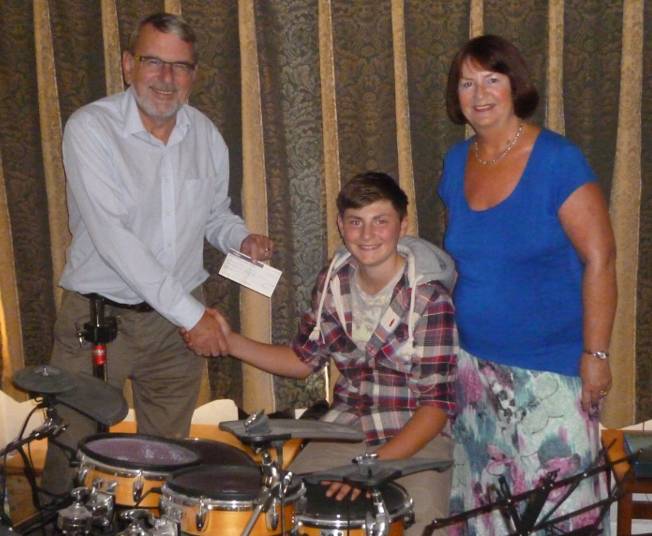 Leonard Eadon receiving a cheque from Napton Festival Music Trust